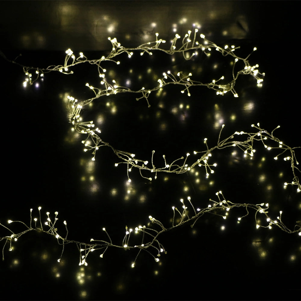 Catena luminosa cluster con 300 LED bianco caldo su filo di rame flessibile