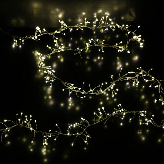 Catena luminosa cluster con 300 LED bianco caldo su filo di rame flessibile